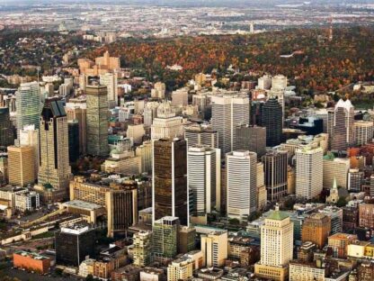 Montreal City Wallpaper is a photo wall mural of a cityscape in Montreal one morning in the fall from About Murals.