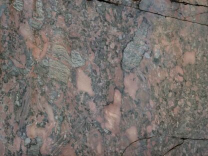 Brown Marble Wallpaper is a wall mural of a textured marble slab with broken cracks from About Murals.