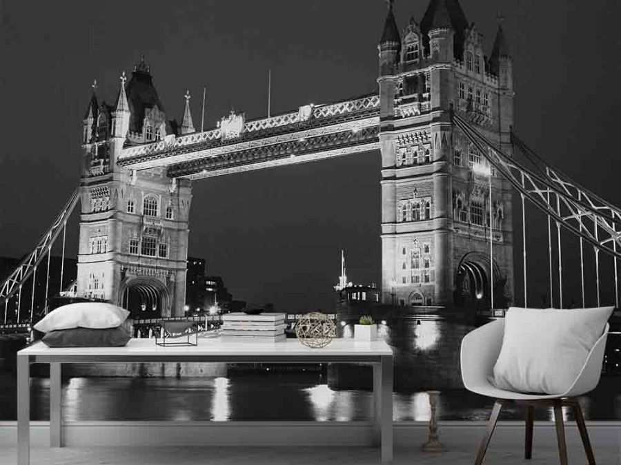 Tower Bridge Wallpaper, as seen on the wall of this grey dining room, is a black and white photo mural of the famous suspension bridge in London, England from About Murals.