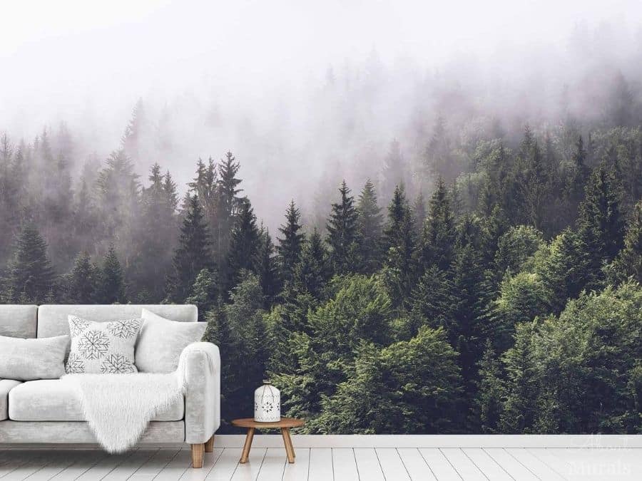 Shop the Black Friday Wallpaper Sale, like this foggy forest wallpaper in a living room, from About Murals.