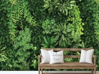 Living Wall Wallpaper, as seen on the wall of this hallway, is a mural featuring a wall full of botanical green leaves from About Murals