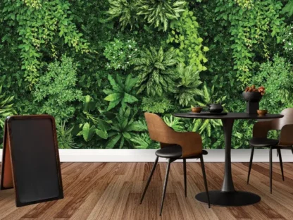 Living Wall Wallpaper, as seen on the wall of this restaurant, is a wall mural featuring a lush vertical garden full of natural green leaves from About Murals.