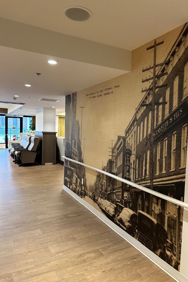 Dementia friendly wallpaper, using a vintage photo of a local neighbourhood, can be used in reminiscence therapy to stimulate mental activity and improve well-being.