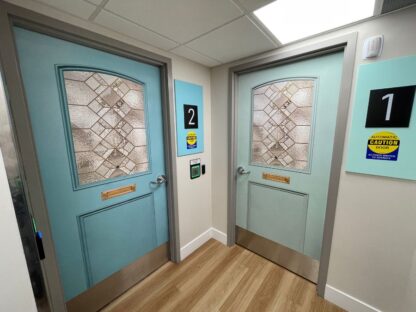 Dementia Door Wrap, as seen on the door of a memory care home in Canada, is a wallpaper decal that is placed over a bedroom door to help residents navigate hallways and corridors from About Murals.