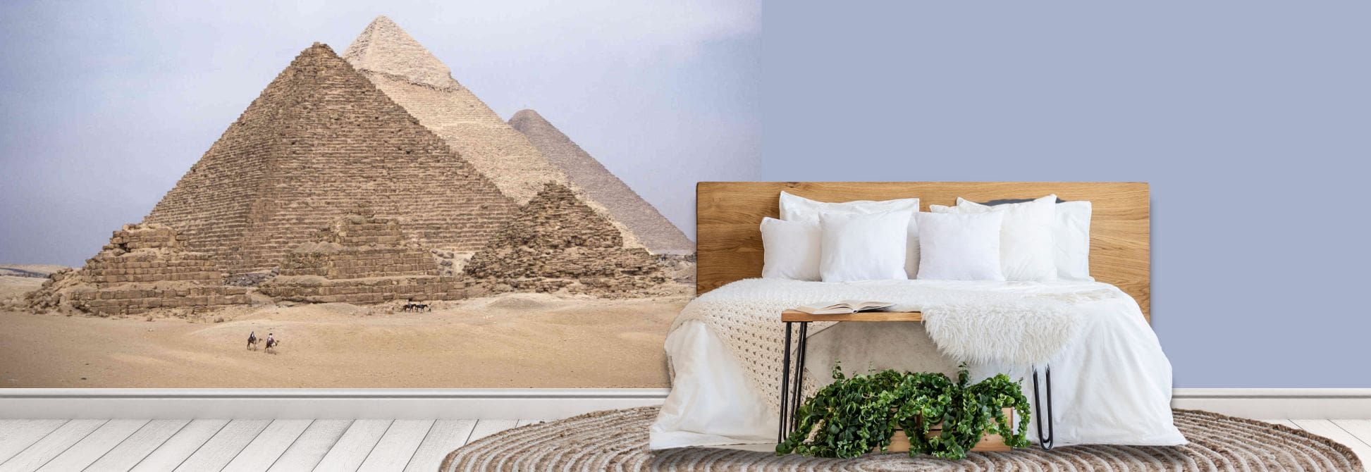 African city wallpaper mural, as seen on the wall of this bedroom, is a photo mural of the pyramids in Egypt from About Murals.