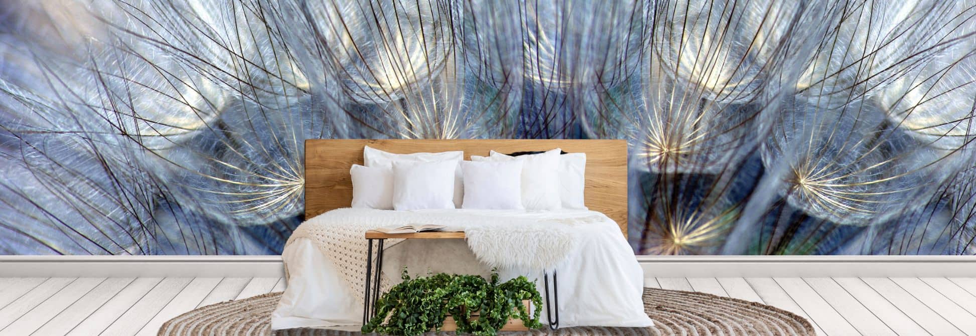 Surface detail wallpaper, as seen on the wall of this bedroom, is a macro wall mural featuring a close-up photo of textured dandelion seeds from About Murals