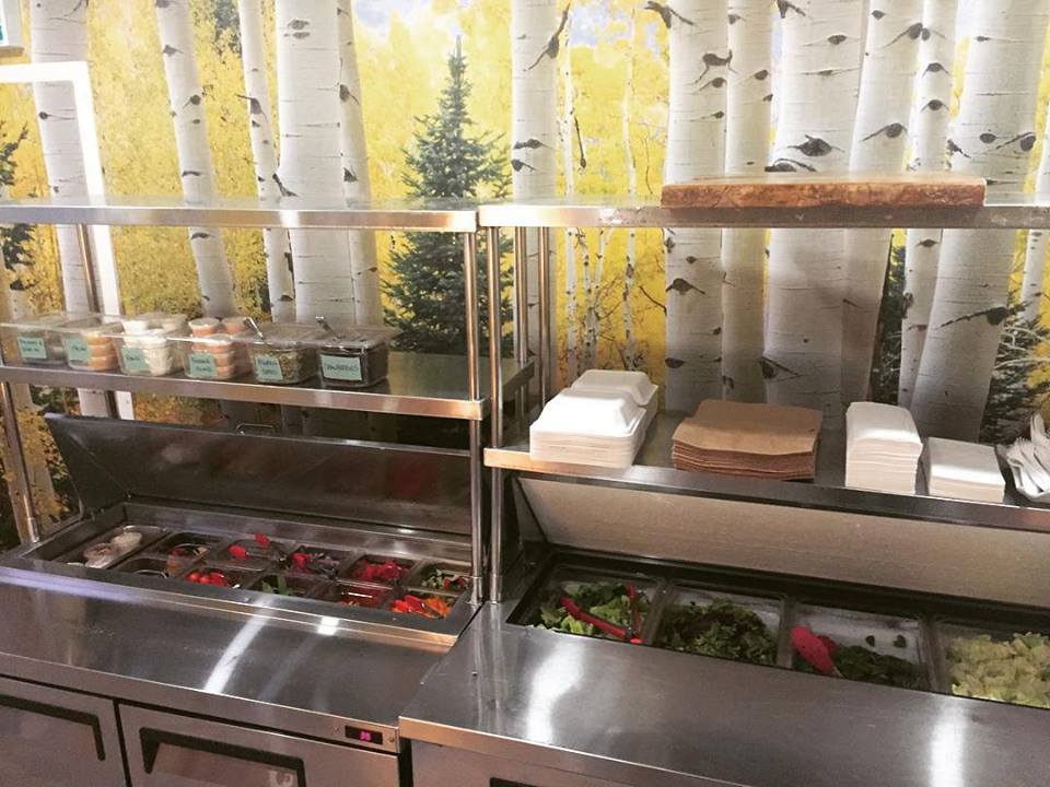 Restaurant theme wallpaper in a forest theme, that's washable, in a diner in Hamilton, ON, Canada by About Murals.