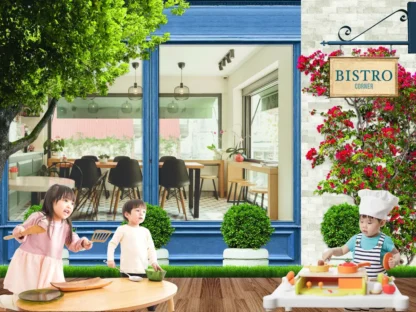 Blue Bistro Wallpaper, as seen on the wall of an indoor playground, is a mural featuring the outside facade of a diner from About Murals