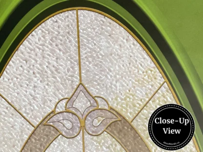 A close-up view of a green dementia door decal with its sparkly stained glass from About Murals