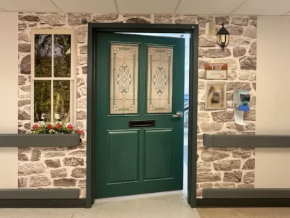 Green dementia door wallpaper in a long term care facility from About Murals