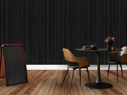 Black Wood Slat Wallpaper, as seen on this accent wall of a cafe, is a wall mural with sleek vertical wooden slats with a minimalist look from About Murals.