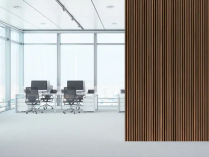 Brown Slat Wallpaper, as seen on the wall of this office, is a 3D mural of brown wooden slats that create a textured look from About Murals.