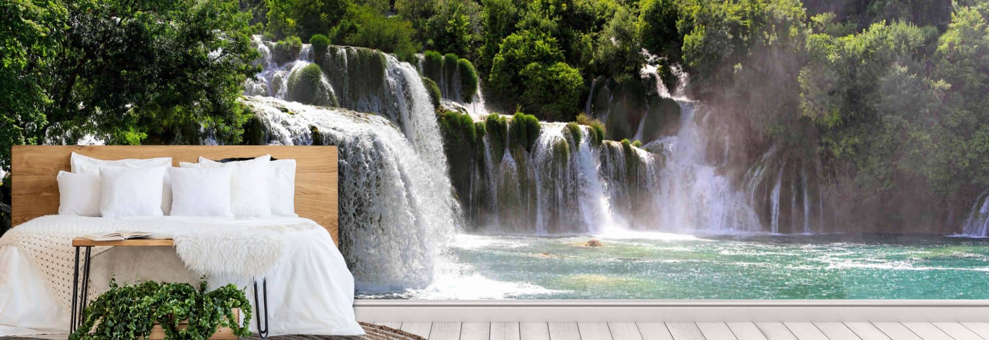 Water wallpaper, as seen on the wall of this bedroom, is a photo wall mural of a beautiful waterfall streaming over mossy rocks into a lake from About Murals.